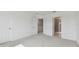 Spacious bedroom with carpet flooring and access to en-suite bathroom at 5439 Tripoli Dr, Palmetto, FL 34221