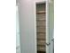 Functional pantry with wooden shelves for ample storage at 23466 Garrett Ave, Port Charlotte, FL 33954
