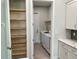 Walk-in pantry with ample shelving at 23466 Garrett Ave, Port Charlotte, FL 33954