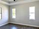Spacious bedroom featuring neutral walls and tile floors at 23466 Garrett Ave, Port Charlotte, FL 33954