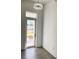 Foyer with shiplap walls and gray tile floors at 23466 Garrett Ave, Port Charlotte, FL 33954