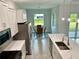 Kitchen with breakfast nook and view of backyard at 23466 Garrett Ave, Port Charlotte, FL 33954