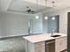 Open concept kitchen with island and stainless steel appliances at 23466 Garrett Ave, Port Charlotte, FL 33954