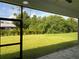 Enjoy the view from this screened patio at 23466 Garrett Ave, Port Charlotte, FL 33954