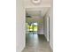 Bright and airy living room with sliding glass doors at 23466 Garrett Ave, Port Charlotte, FL 33954