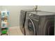 Laundry room with washer and dryer at 11519 Misty Isle Ln, Riverview, FL 33579