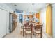 Kitchen with wood cabinets, stainless steel appliances, and breakfast nook at 11519 Misty Isle Ln, Riverview, FL 33579