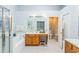 Bathroom with a garden tub, double sinks, and a separate shower at 11519 Misty Isle Ln, Riverview, FL 33579