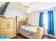 Bedroom with a double bed and dresser at 11519 Misty Isle Ln, Riverview, FL 33579