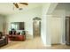Hallway with light walls and wood flooring at 11519 Misty Isle Ln, Riverview, FL 33579
