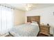 Bright bedroom with a comfortable bed and window with curtains at 11519 Misty Isle Ln, Riverview, FL 33579