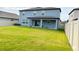 Expansive backyard with lush green lawn and privacy fence, perfect for outdoor enjoyment and entertainment at 3522 N Maryland Ave, Plant City, FL 33565