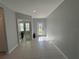 Bright entryway with tile flooring and a view to a room with French doors at 3522 N Maryland Ave, Plant City, FL 33565