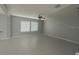 Bright living room with tile flooring and large windows at 3522 N Maryland Ave, Plant City, FL 33565