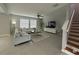 Spacious living room with tile flooring, neutral decor, and lots of natural light at 3522 N Maryland Ave, Plant City, FL 33565