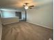 Spacious loft area with neutral carpet and plenty of room for activities at 3522 N Maryland Ave, Plant City, FL 33565