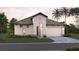 One-story home with a two-car garage and landscaped yard at 228 Vistera Blvd, Nokomis, FL 34275
