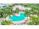 Community pool and clubhouse viewed from above at 10307 Coral Landings Lane N Ln # 10, Placida, FL 33946