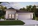 One-story home with a two-car garage and landscaped lawn at 16851 Sol Preserve Dr, Port Charlotte, FL 33953