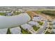 Community overview with lake and homes at 18019 Cherished Loop, Bradenton, FL 34211