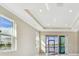 Bright bedroom with water views and sliding glass doors at 18019 Cherished Loop, Bradenton, FL 34211