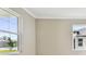 Bedroom with large windows and neutral walls at 18019 Cherished Loop, Bradenton, FL 34211
