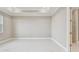 Bright bedroom with neutral walls and tile flooring at 18019 Cherished Loop, Bradenton, FL 34211