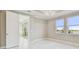 Spacious bedroom with large windows and tile flooring at 18019 Cherished Loop, Bradenton, FL 34211