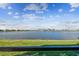 Tranquil lake view from screened enclosure at 18019 Cherished Loop, Bradenton, FL 34211