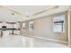 Bright living room with tile floors and access to the backyard at 18019 Cherished Loop, Bradenton, FL 34211