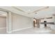 Open living area with view into kitchen at 18019 Cherished Loop, Bradenton, FL 34211
