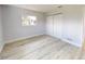 Bedroom featuring wood-look flooring and a closet at 416 Gulf Breeze Blvd, Venice, FL 34293