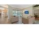 Inviting living room space with a view of the pool through sliding glass doors at 8809 Havenridge Dr, Sarasota, FL 34238