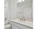 Bright bathroom features a sleek vanity with quartz countertop, modern fixtures, and tiled shower at 9809 Last Light Gln, Parrish, FL 34219