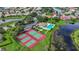 Community overview showing tennis courts and pool at 750 Pond Lily Way, Venice, FL 34293