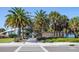 Venice Beach access point with palm trees and walkway at 859 S Green Cir, Venice, FL 34285