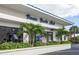 Venice Yacht Club building, palm trees, and landscaping at 859 S Green Cir, Venice, FL 34285