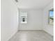 Bright bedroom featuring hard flooring, neutral paint, and modern window coverings at 18063 Cherished Loop, Bradenton, FL 34211