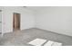 Bright bedroom with neutral carpet, paint, and trim, ready for personalization at 18063 Cherished Loop, Bradenton, FL 34211