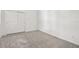 Carpeted bedroom featuring a closet with sliding doors and neutral walls at 18063 Cherished Loop, Bradenton, FL 34211