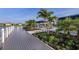 Picturesque dock featuring beautiful landscaping with stunning views of the community at 18063 Cherished Loop, Bradenton, FL 34211