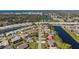 Residential area with waterway and pond views, showcasing proximity to major highways and community amenities at 1336 Roosevelt Dr, Venice, FL 34293