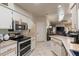 Spacious kitchen with wood countertops, stainless steel appliances, and an easy transition to living area at 1336 Roosevelt Dr, Venice, FL 34293