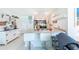 Bright kitchen with breakfast bar, sleek countertops, and modern appliances for efficient cooking at 18149 Dillon Ave, Port Charlotte, FL 33954