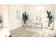 Bright home office with a modern desk, natural light, and stylish decor at 229 Vistera Blvd, North Venice, FL 34275