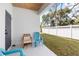 Inviting backyard patio with comfortable seating and a view of the manicured lawn at 3508 E 11Th Ave, Tampa, FL 33605