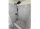Modern bathroom with a rainfall shower head and tiled walls at 3542 Trask Dr, Holiday, FL 34691