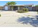 Charming single-story home with a well-maintained front yard and a long concrete driveway at 3542 Trask Dr, Holiday, FL 34691