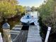 Private boat dock with easy access to waterway, perfect for boating enthusiasts and waterfront living at 468 Ceil Dr, Nokomis, FL 34275