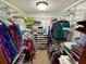 Walk-in closet with organized shelving and ample storage space for clothing and accessories at 468 Ceil Dr, Nokomis, FL 34275
